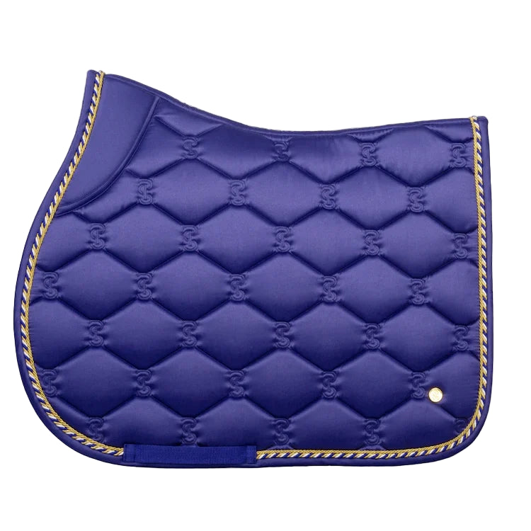 Blue quilted saddle pad with gold trim on a white background